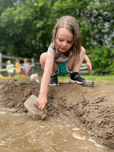 kids playing in mud